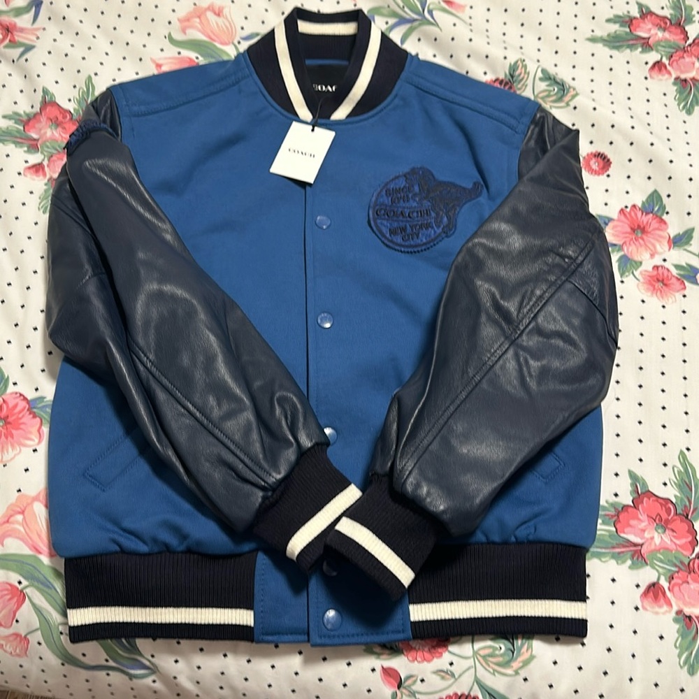 New Coach jacket for men. Sleeves on leather. Never worn
